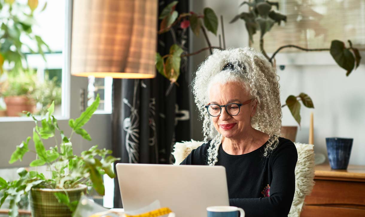 senior woman working at home