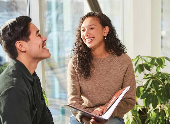 Two employees working together