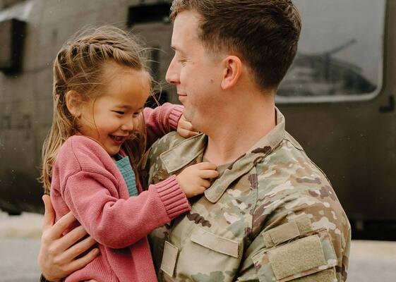 military service member with daughter