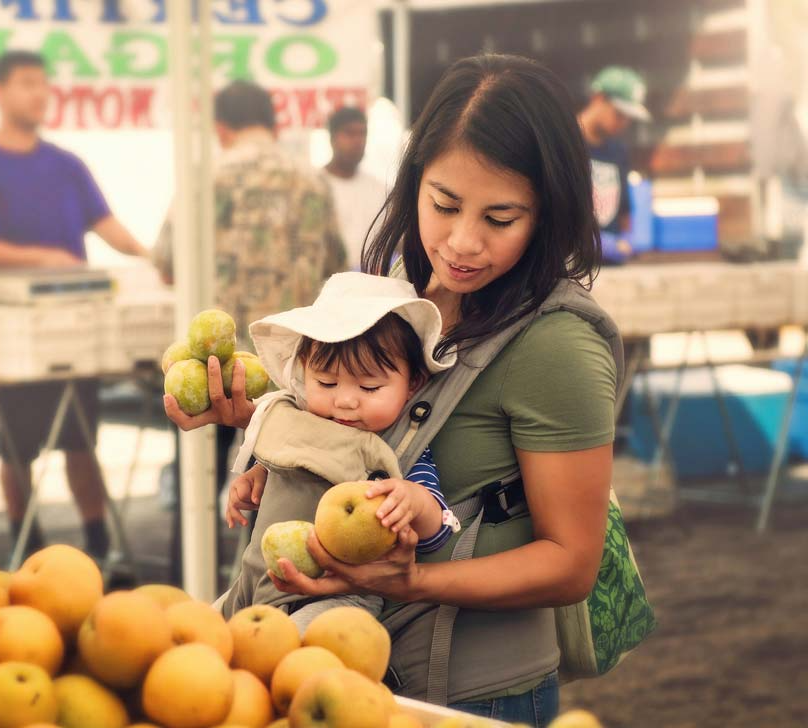 woman and son at farmer's market