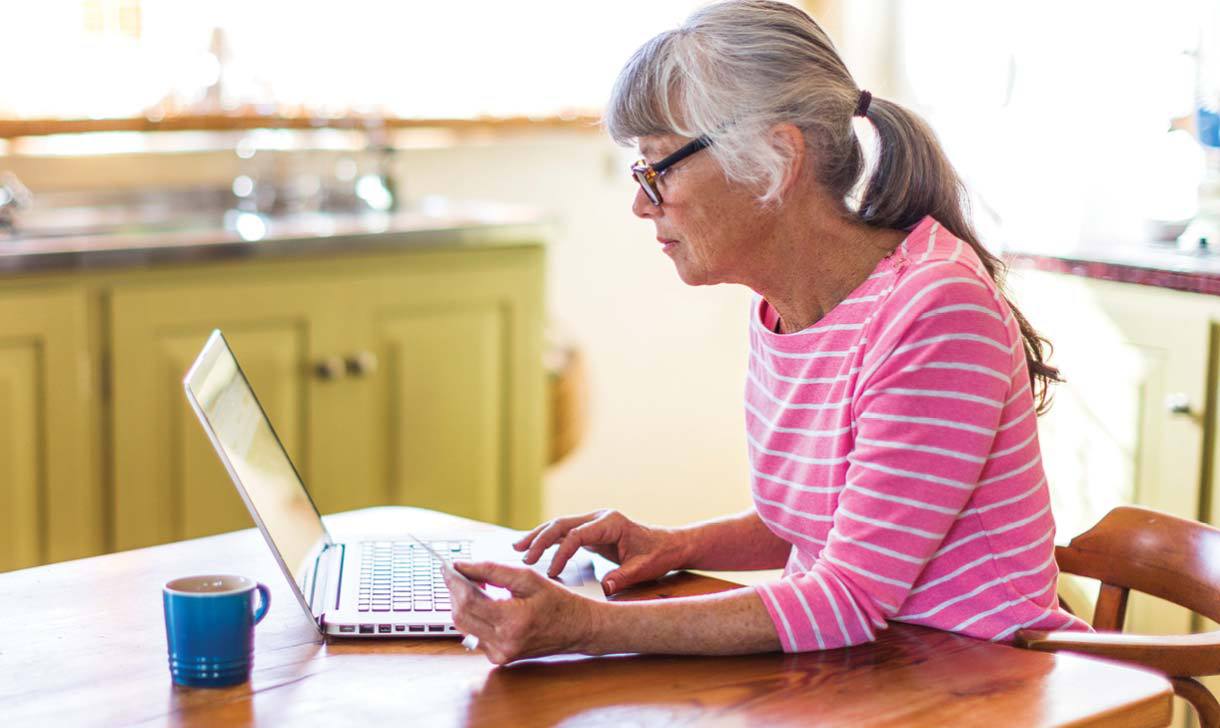 Middle Aged Woman with Laptop