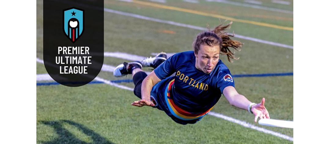 woman professional frisbee player diving for frisbee with premier ultimate logo
