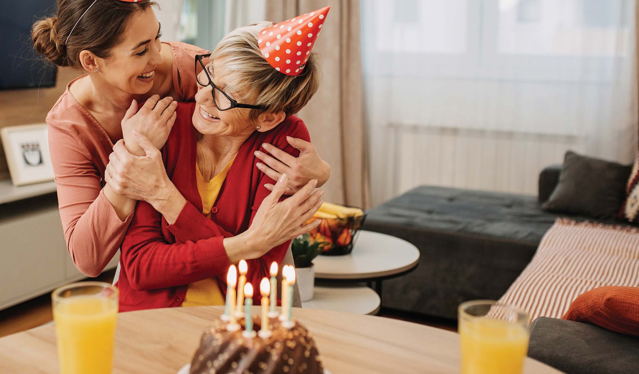 Two People Celebrating Birthday with Cake