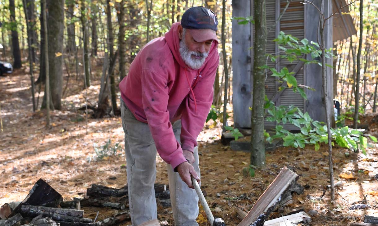 man chopping wood