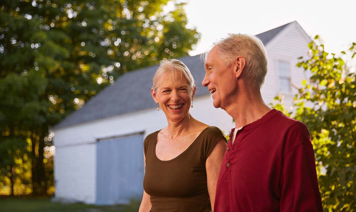 senior couple walking outside