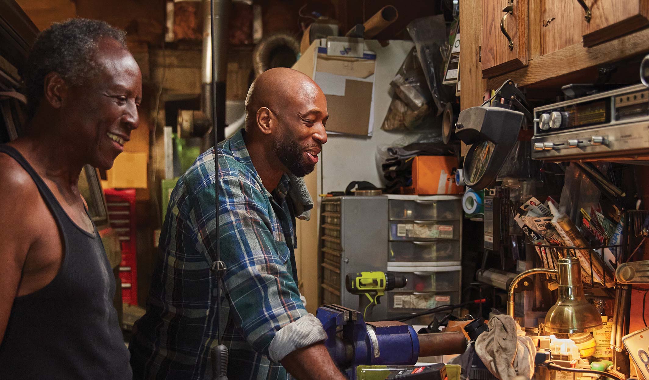 two men working in a garage
