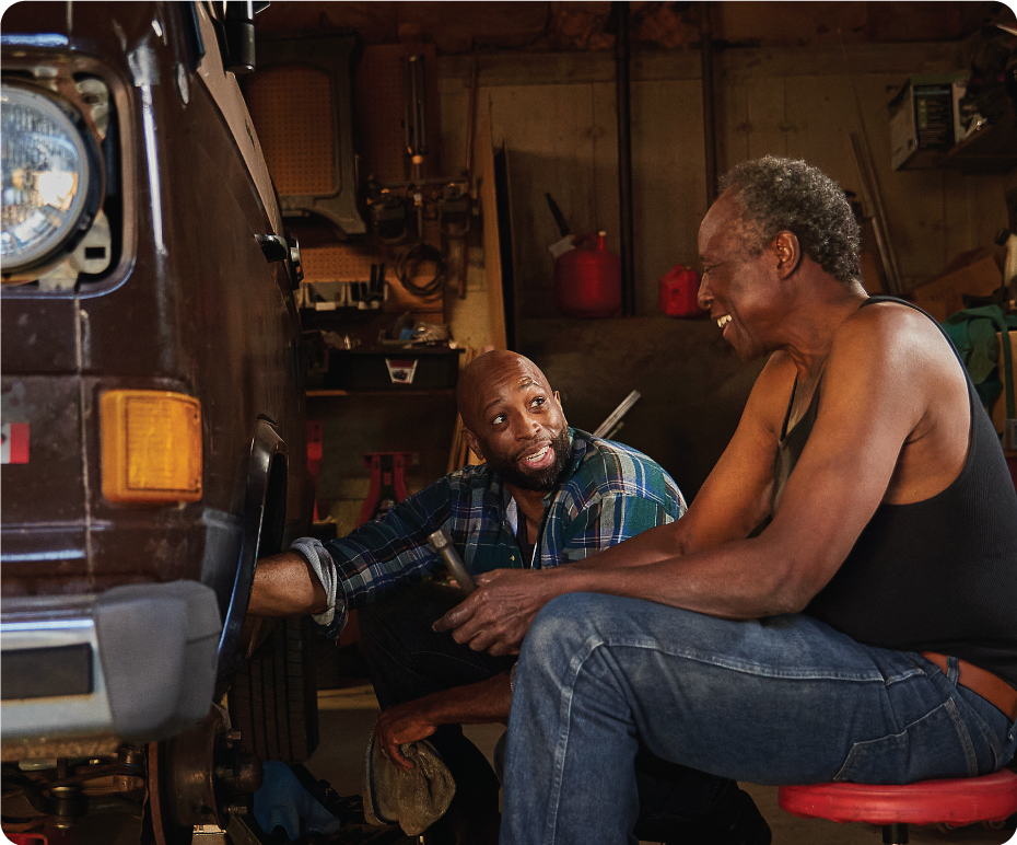two men working on a car