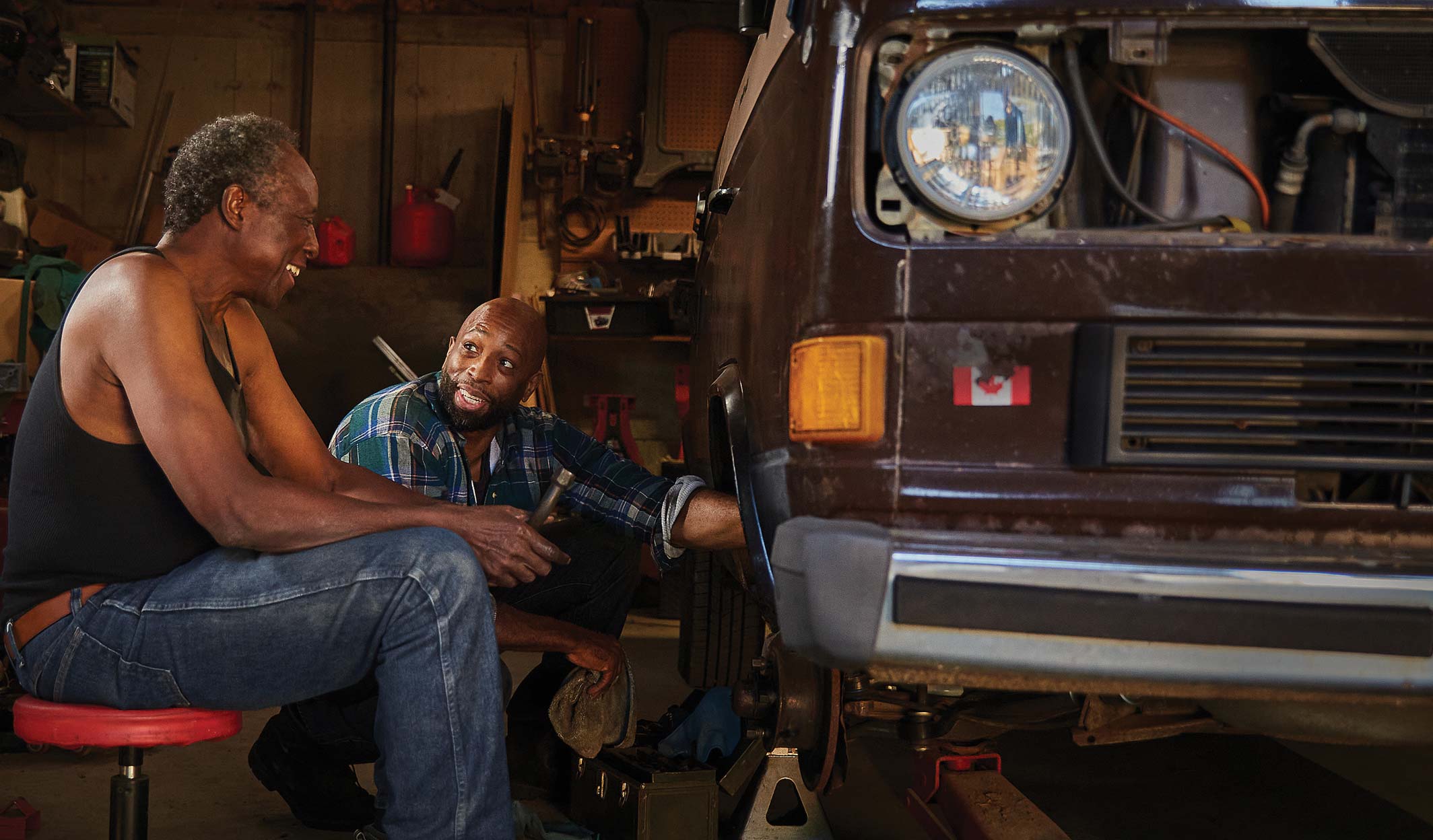 two men working on a car
