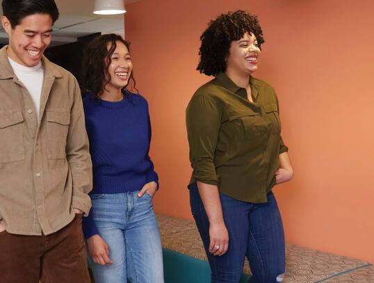 Employee group walking down hall