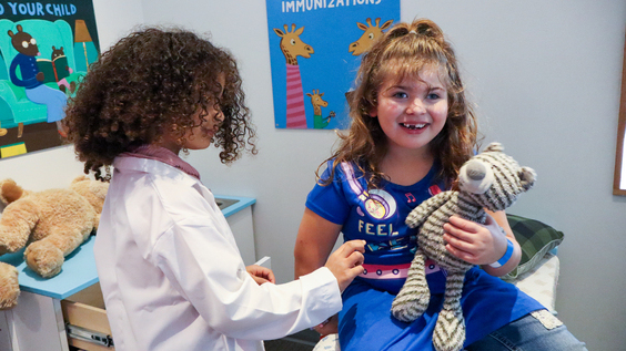 girls playing at museum