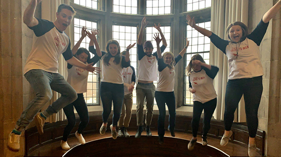 group of youth jumping