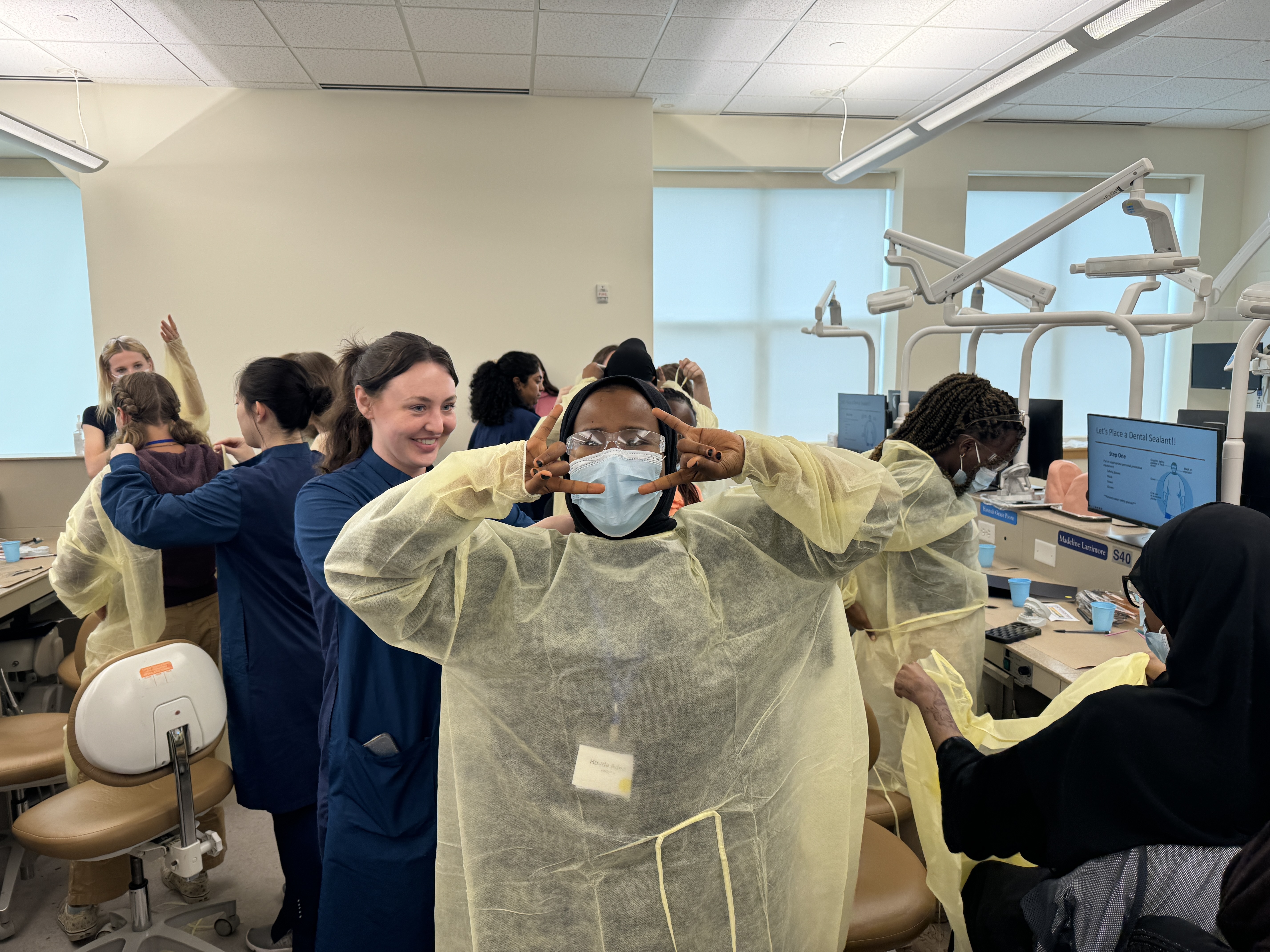 UNE student with PPE