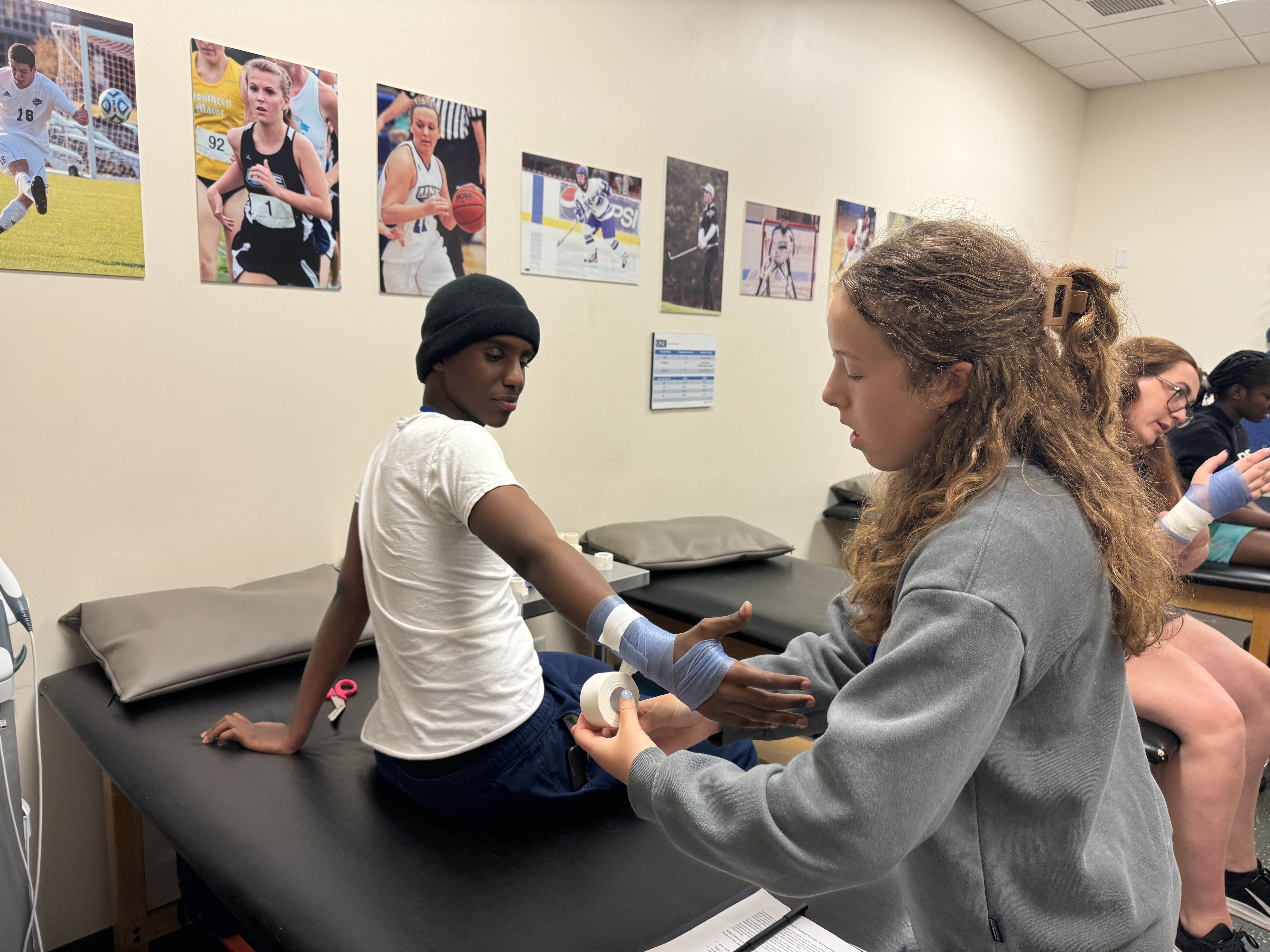 UNE student with patient