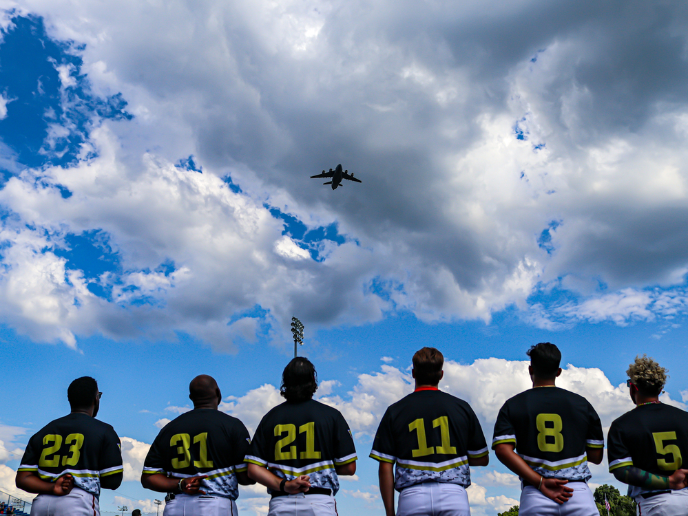 Military plane flyover with baseball players at Washington Wild Things game