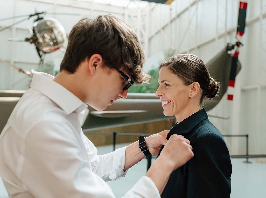 woman and young man at military base