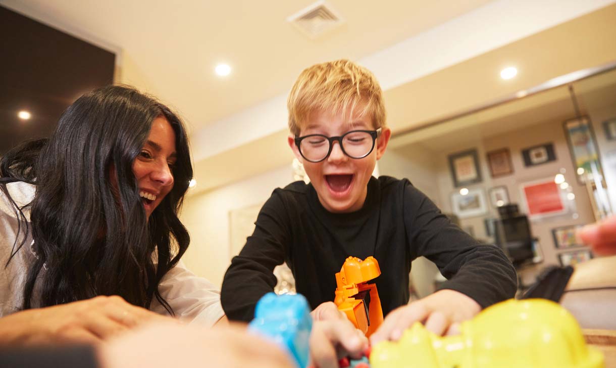 mother and son playing