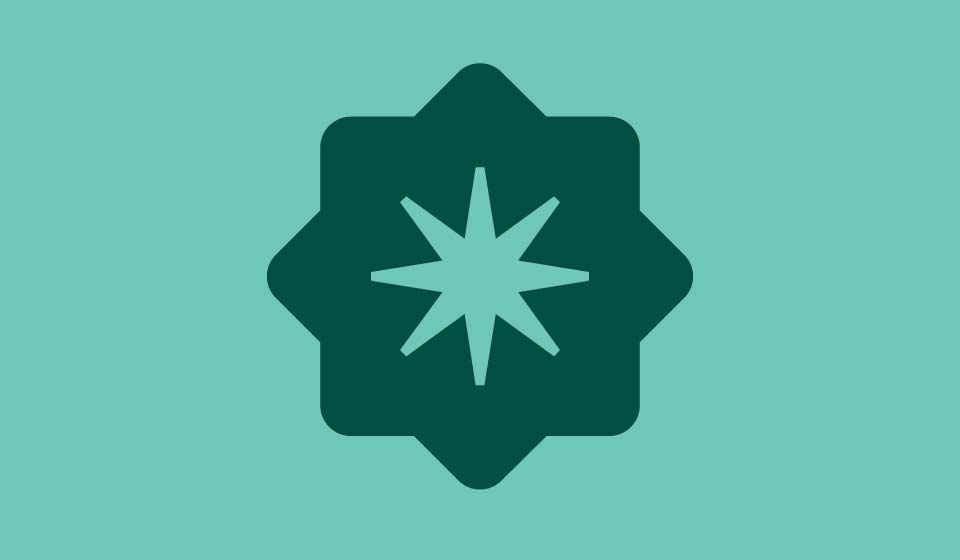 Martin’s Point brand medallion in dark green on a seafoam background.