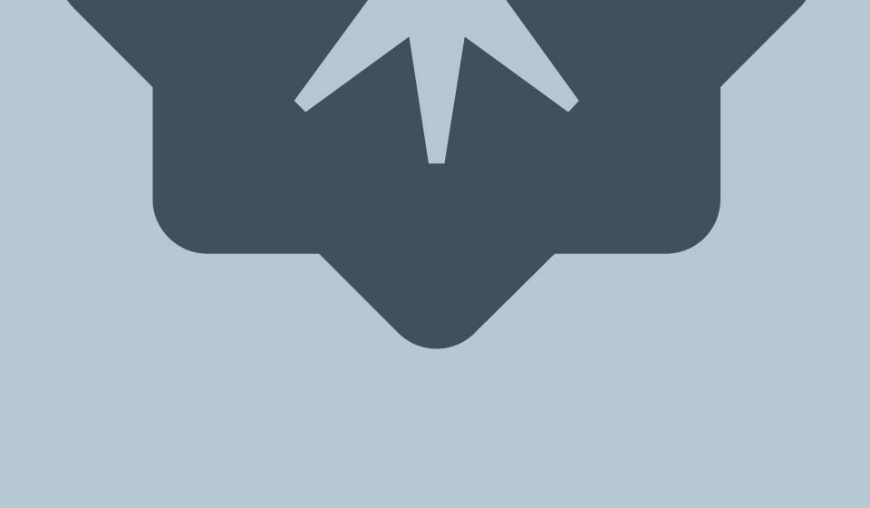 Lower portion of Martin’s Point brand medallion in dark blue on a light blue background.