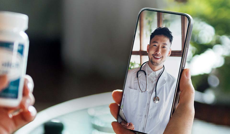 Member having a virtual doctor visit on a smartphone.