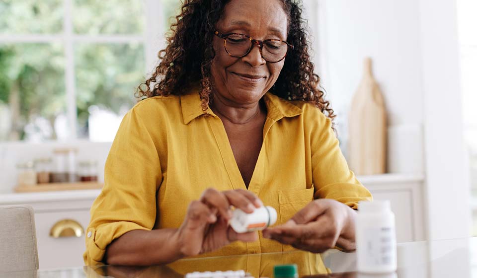 Woman taking prescription medication